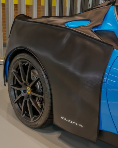 An image of a trailored fit body protection with a fuel cap opening.