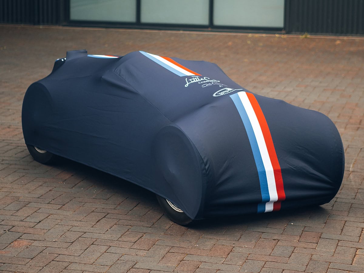 An image of a custom printed indoor car cover on a Bugatti.