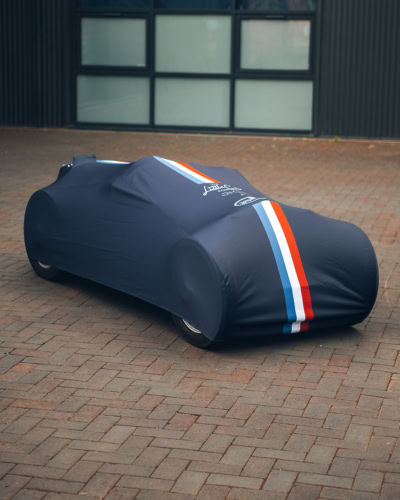 An image of a custom printed indoor car cover on a Bugatti.