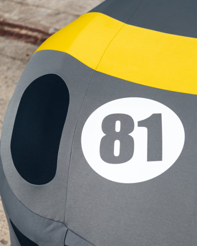 A close up image of an Indoor Silhouette cover designed to look like a Ferrari 599 with a racing livery.