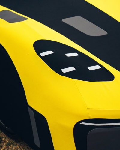 A close up image of an Indoor Silhouette cover designed to look like a Porscxhe Cayman GT4 RS