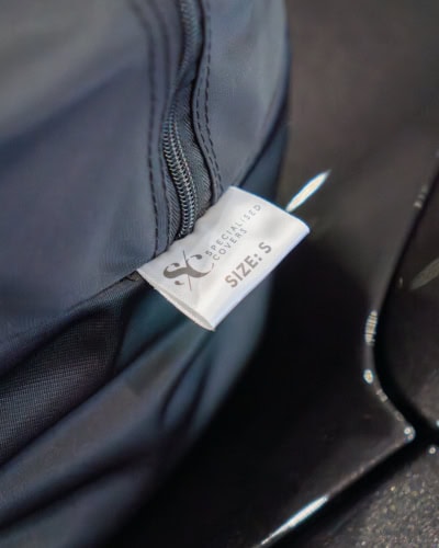 A close up of the size tag on a Indoor Lite cover.
