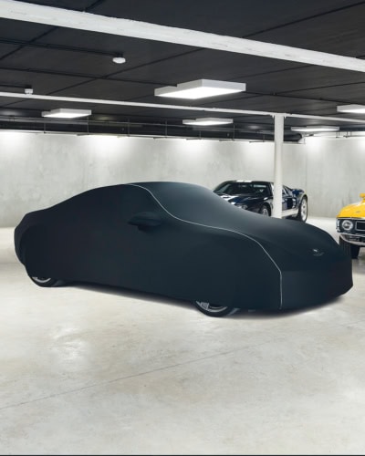 A picture of an Indoor Pro Car Cover with a tailored fit on a Porsche,