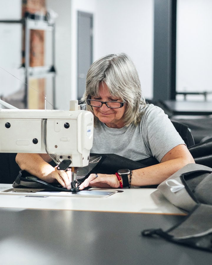 A picture of our production team sewing in our UK factory.