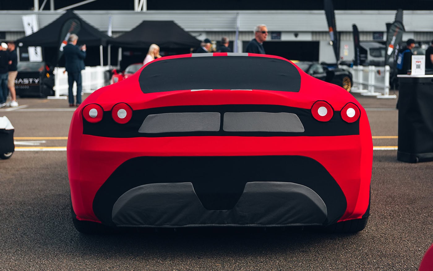 An Indoor Silhouette Car Cover on designed to look like a Ferrari F430 Scuderia