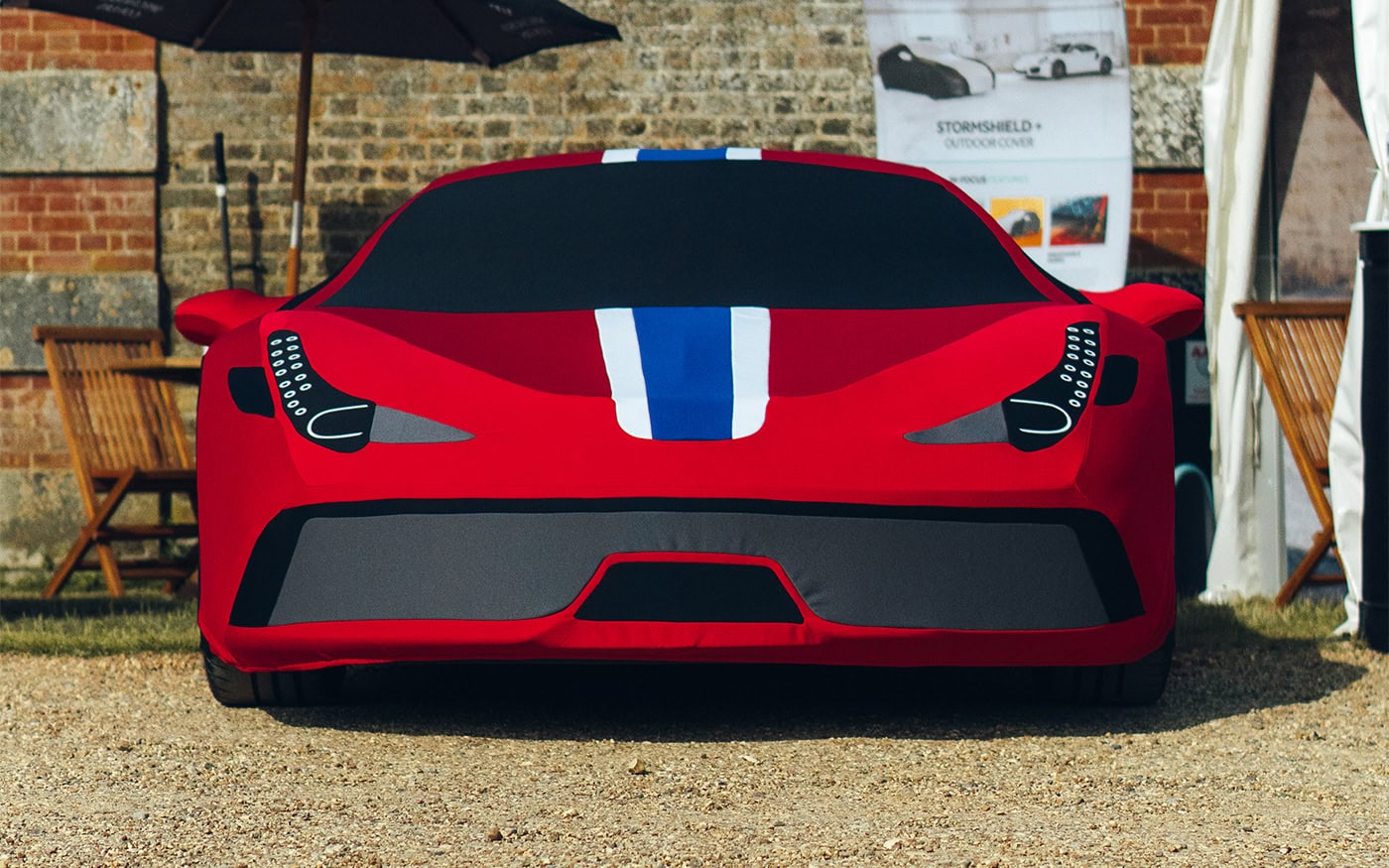 An Indoor Silhouette Car Cover on designed to look like a Ferrari 458 Speciale