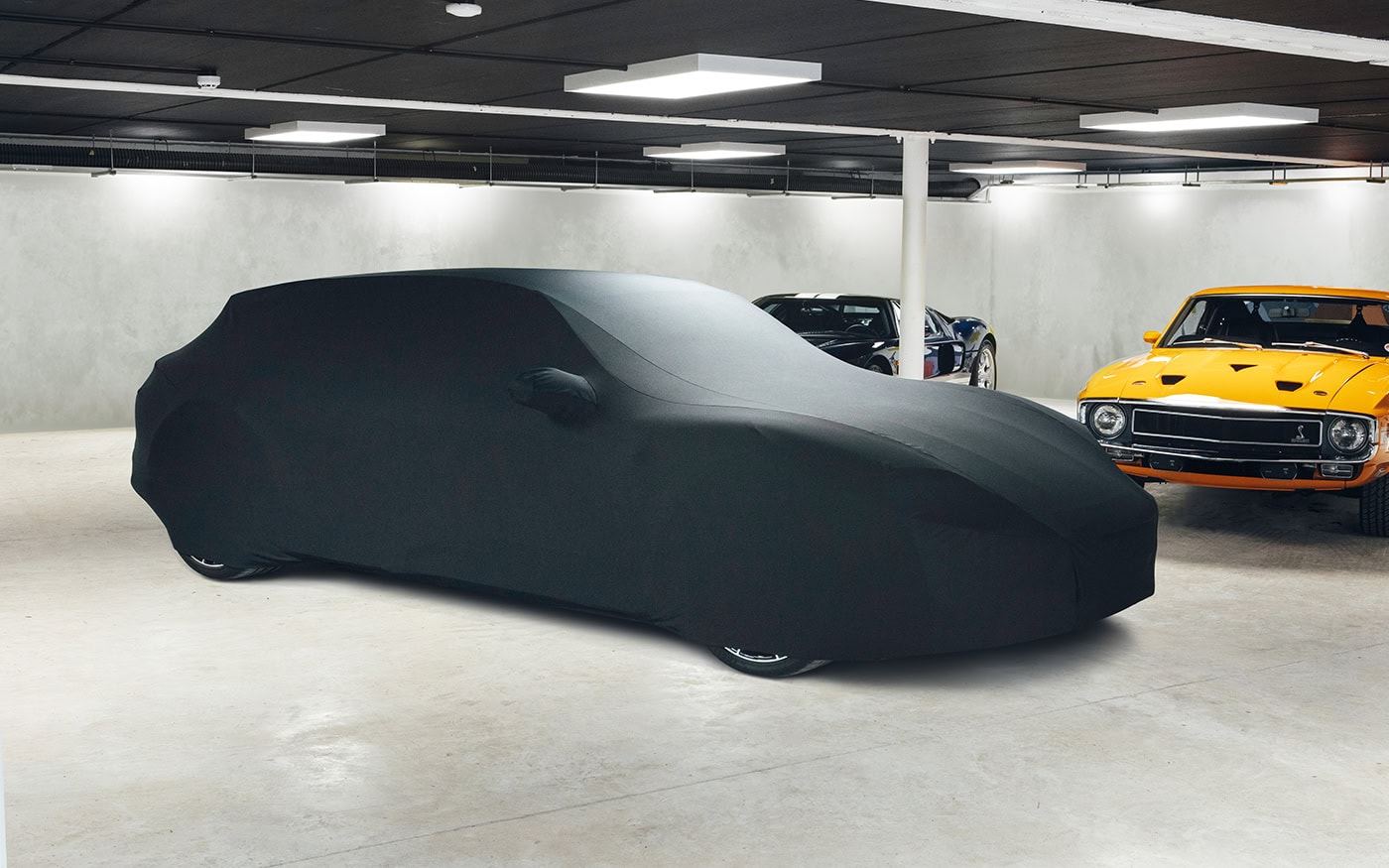A picture of a porsche with a tailored fitting Indoor Elite car cover.