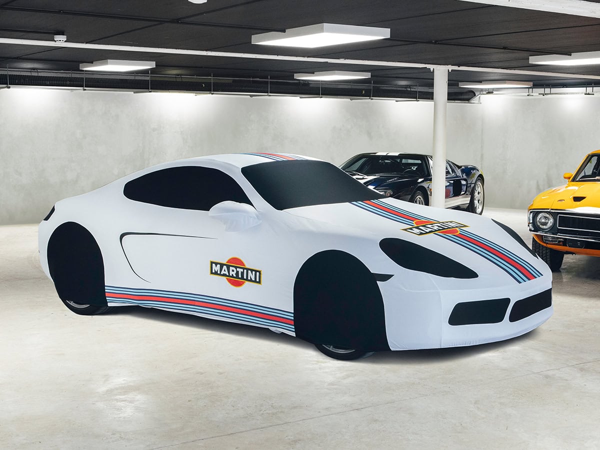 A custom printed Martini Livery cover on a Porsche.