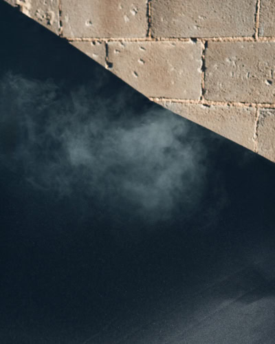 Steam rising through a breathable indoor cover.