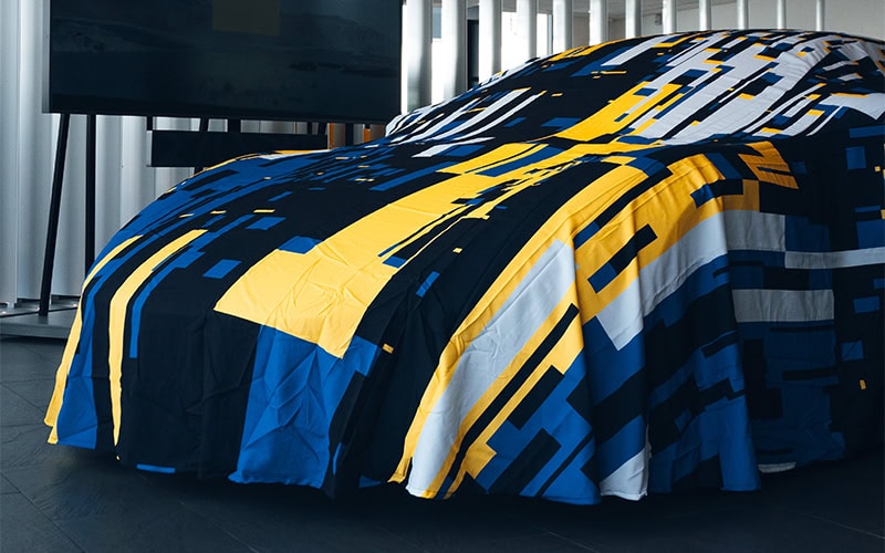 Printed Fabric example on a car reveal cover.